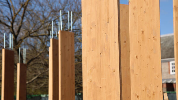 Glulam beams connected by bonded threaded bar