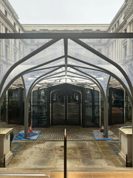 Perspective view of steel canopy leading to pavilion cafe