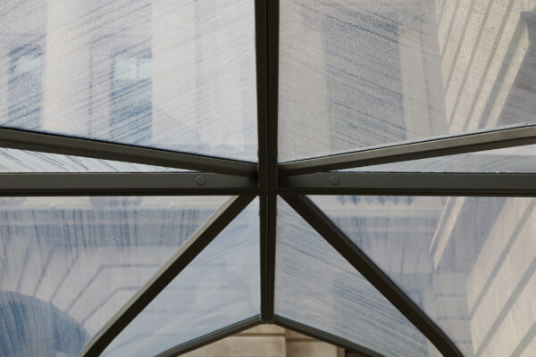 Joining of steel canopy with transparent roofing