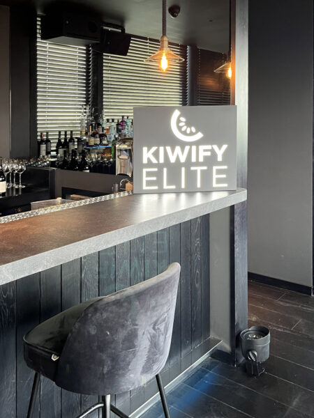 Steel lightbox placed on a bar