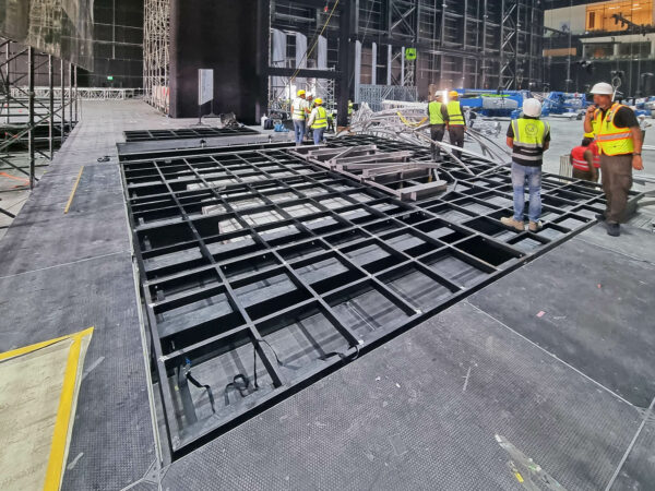 Photo during installation of stage plinth for a fashion show event
