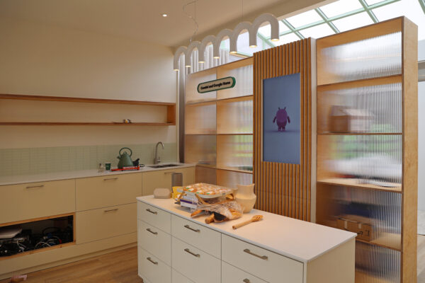 Photo of kitchen scenario inside Gemini exhibition structure for Android Avenue at Mobile World Congress 2025