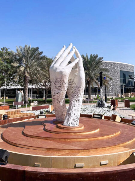 Photo of large scale interlocking hand sculpture