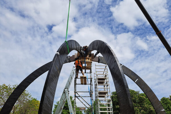 Photo of on-site crew installing timber structure for Serpentine Pavilion of 2025