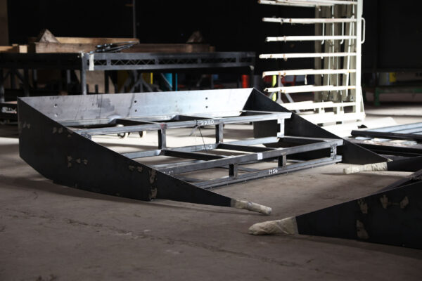 Section of metal staircase on workshop floor