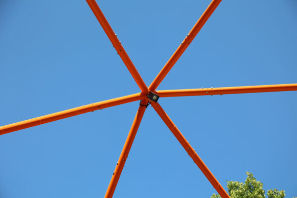 Photo of steel CHS (circular hollow section) node connections painted orange