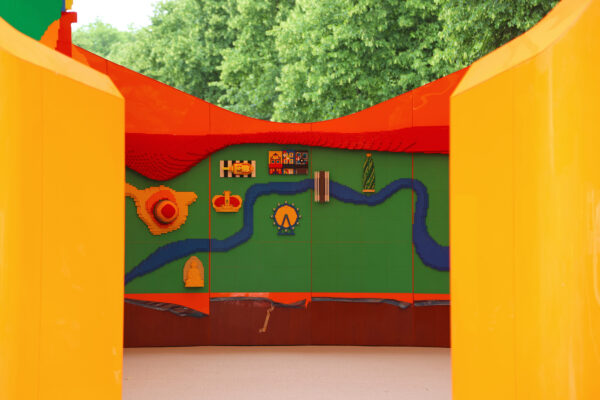 Photo of Play Pavilion interior with LEGO bricks decorating the walls
