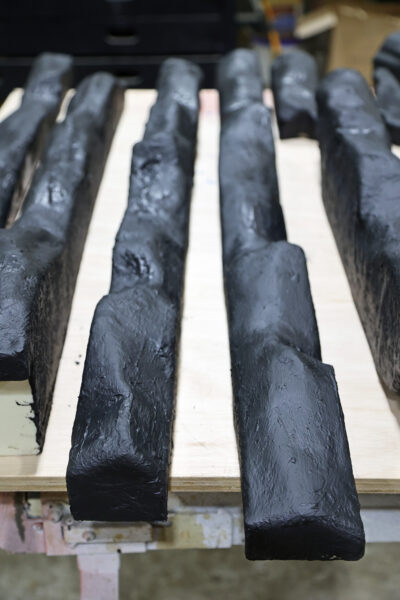 Photo of strips of modelling foam painted black