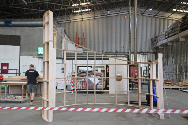 Image of ply curved wall structure in workshop