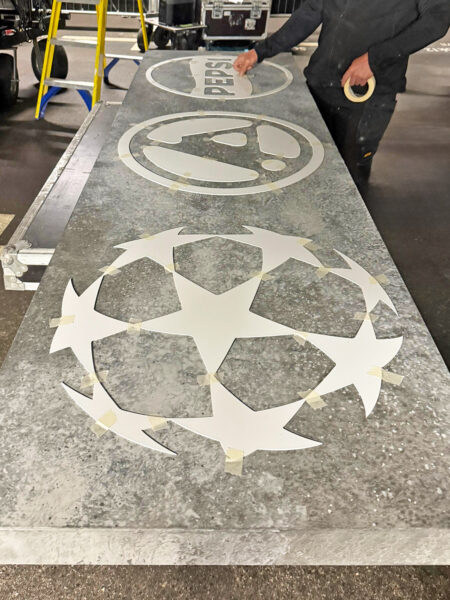 Photo of installing white graphics on fascia panel