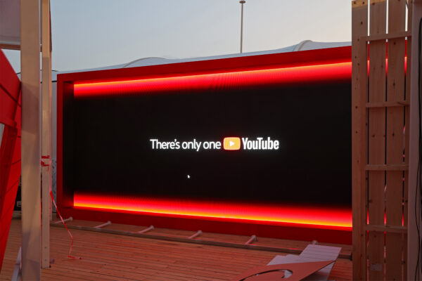 Photo of large screen wit YouTube on display