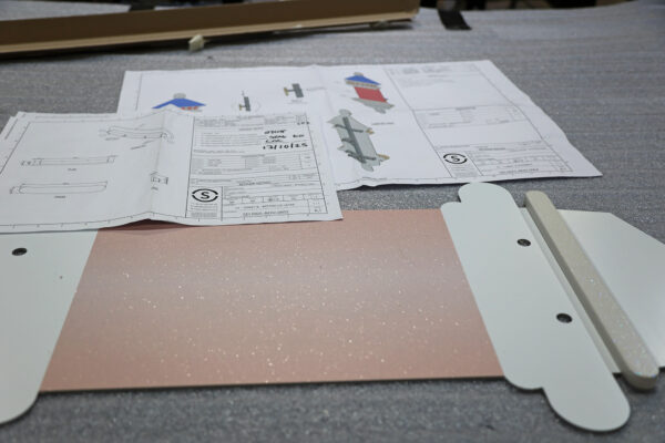 Photo of CAD drawing design and composite panel